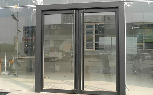 甘德玻璃地弹门